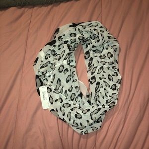 5/25$ Black & white scarf from charming Charlie’s
